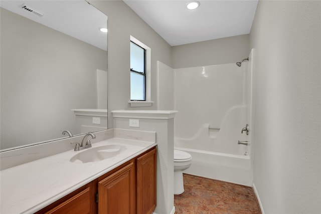 full bathroom with washtub / shower combination, vanity, and toilet