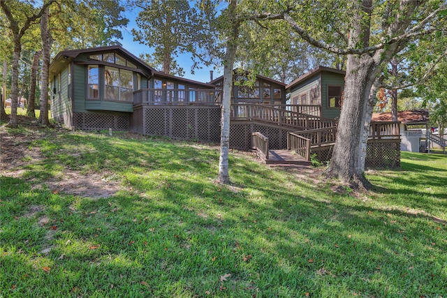 view of yard with a wooden deck