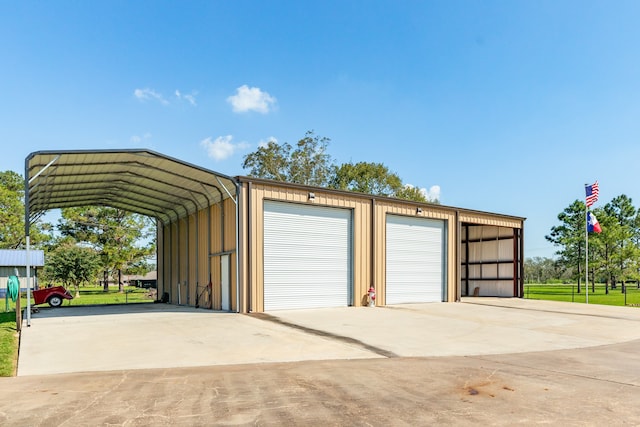 garage featuring a carport