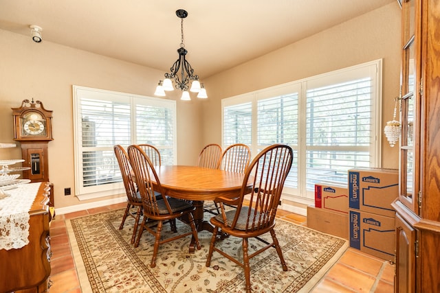 dining area with a chandelier and plenty of natural light