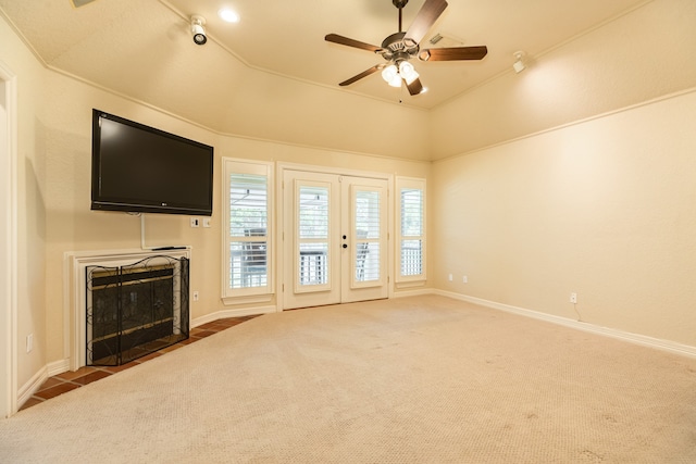 unfurnished living room featuring ornamental molding, french doors, carpet flooring, and ceiling fan