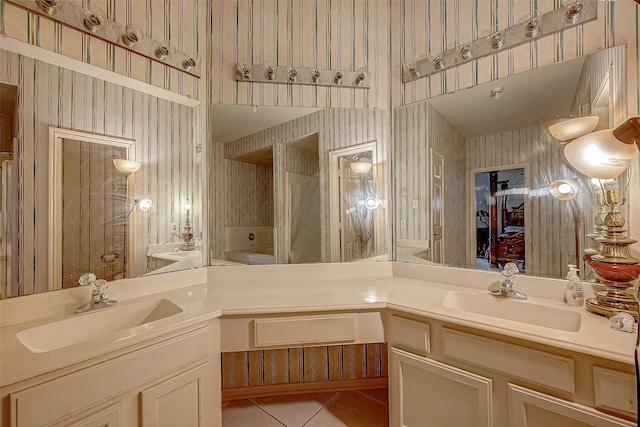 bathroom featuring vanity and tile patterned flooring