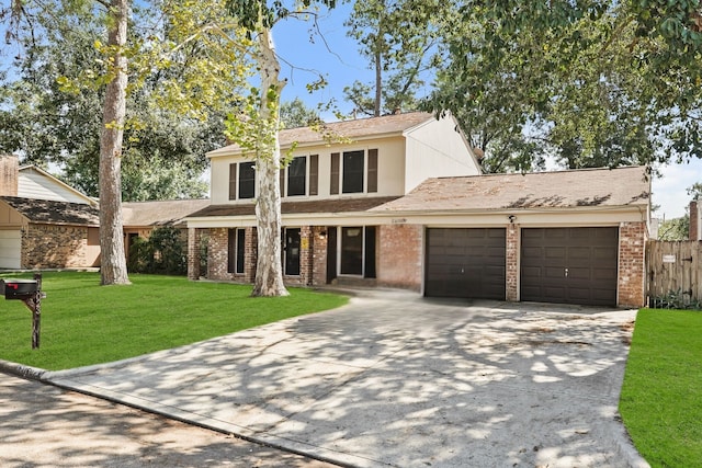 front of property featuring a garage and a front lawn