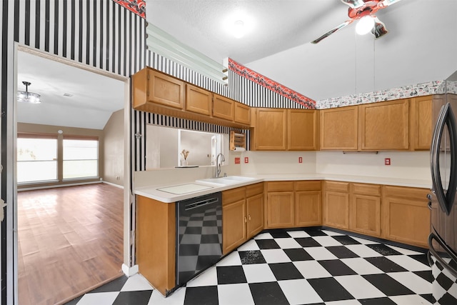 kitchen with ceiling fan, sink, dishwasher, dark hardwood / wood-style floors, and vaulted ceiling