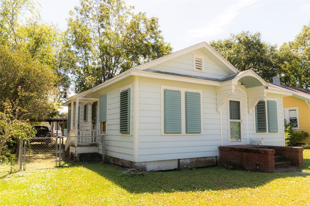 exterior space featuring a lawn