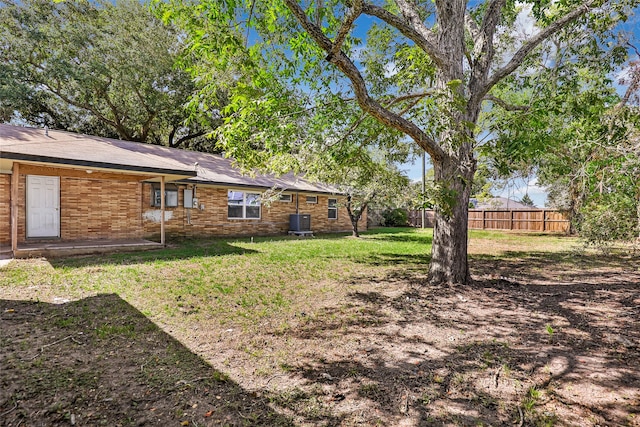 view of yard featuring central AC