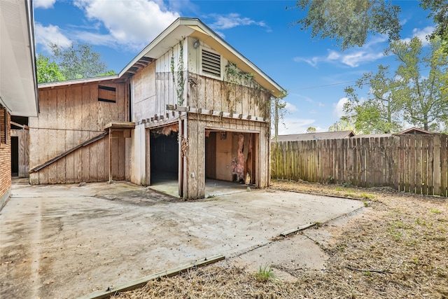 exterior space with wood walls