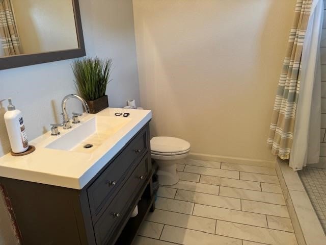 bathroom with tile patterned flooring, vanity, toilet, and a shower with shower curtain