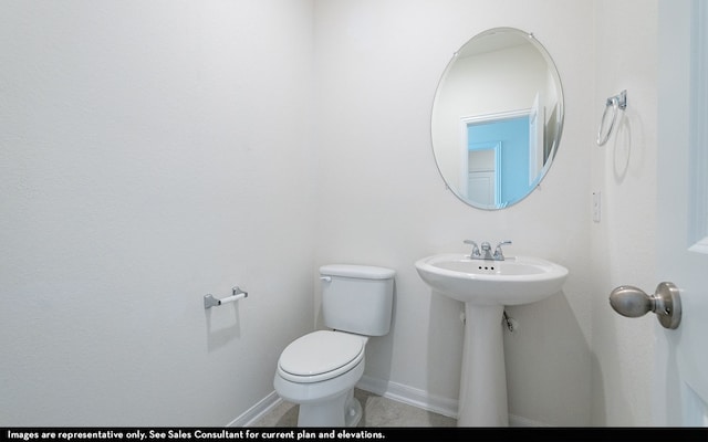 bathroom featuring toilet