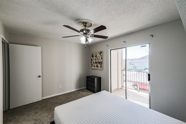 carpeted bedroom with a textured ceiling, ceiling fan, and access to exterior