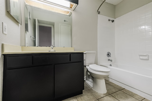 full bathroom with tile patterned flooring, shower / tub combination, vanity, and toilet