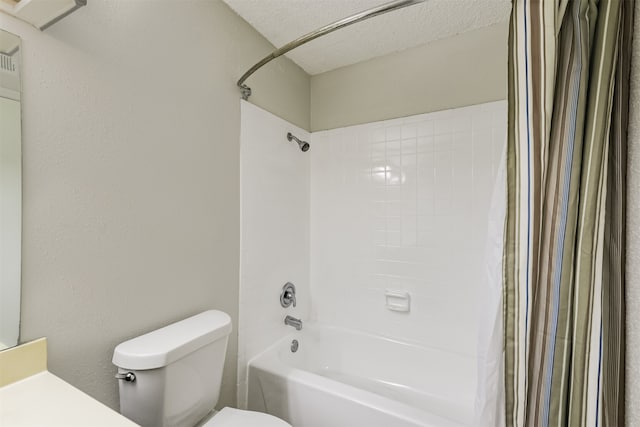 full bathroom with a textured ceiling, vanity, toilet, and shower / bath combination with curtain