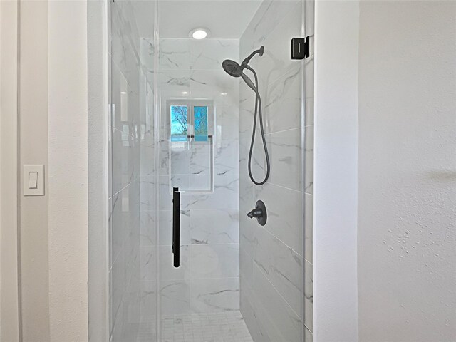 5743 Ludington Dr, Houston, TX 77035 - full bath featuring a marble finish shower