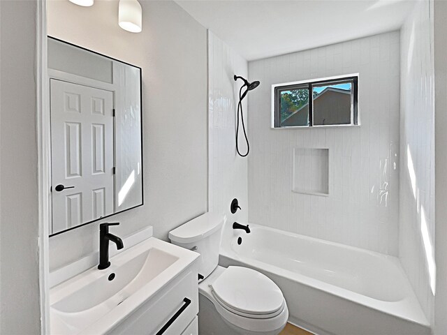 5743 Ludington Dr, Houston, TX 77035 - bathroom with shower / bathtub combination, vanity, and toilet