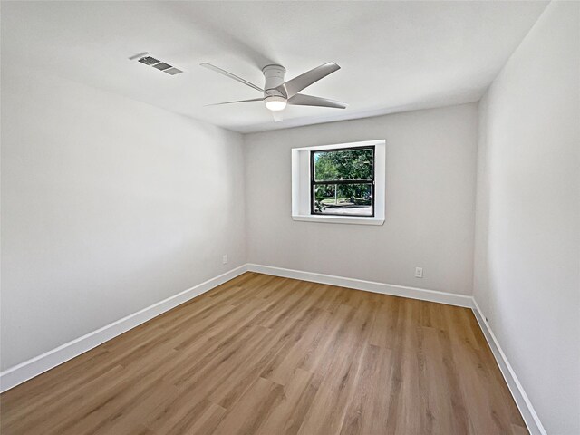 5743 Ludington Dr, Houston, TX 77035 - unfurnished room featuring ceiling fan, baseboards, light wood finished floors, and visible vents