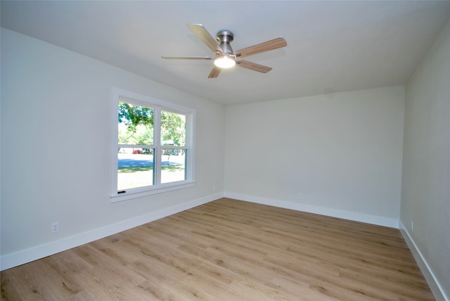 spare room featuring ceiling fan and light hardwood / wood-style floors