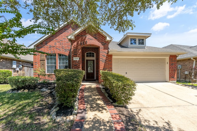 front of property with a garage