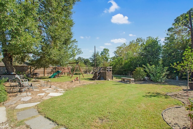 view of yard featuring a playground