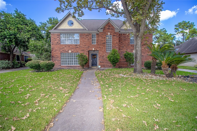 view of front of property with a front lawn