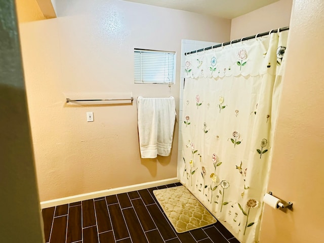 bathroom featuring curtained shower