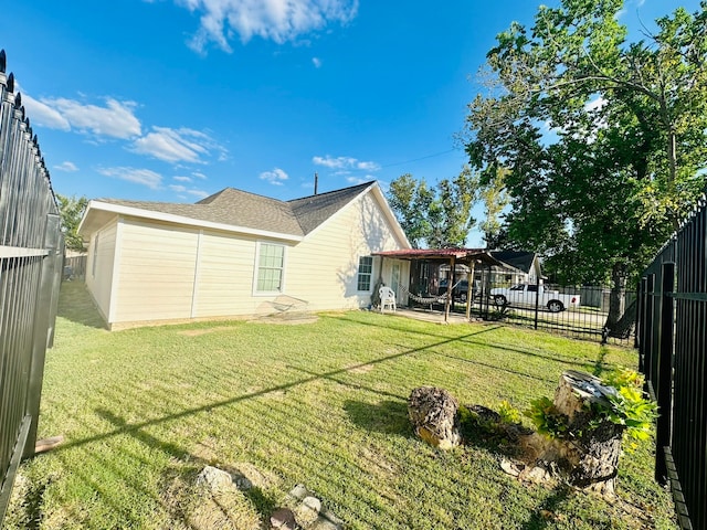 back of property featuring a yard