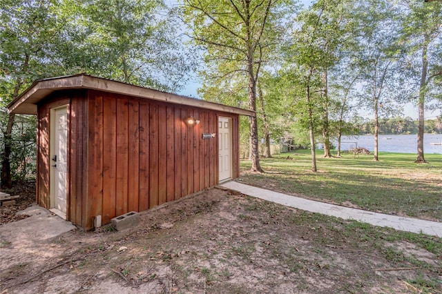 view of shed featuring a water view
