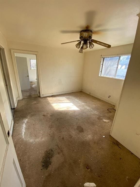 empty room featuring ceiling fan