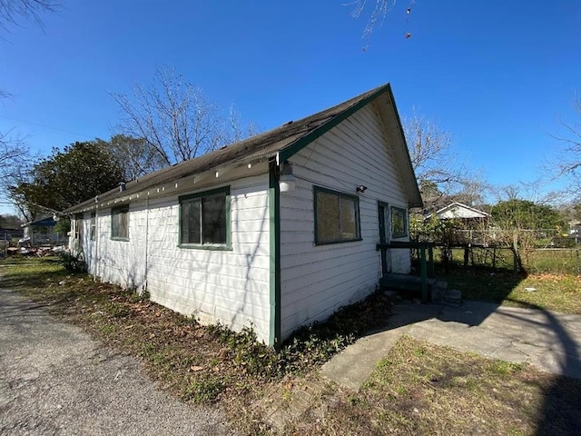 view of side of property featuring a gazebo