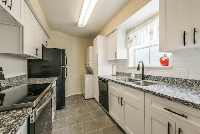 kitchen with white cabinetry, light stone counters, stainless steel range with electric stovetop, dishwasher, and sink