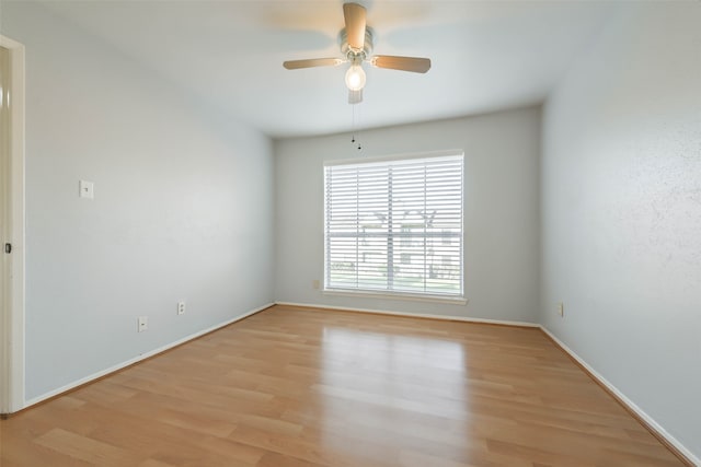 spare room with ceiling fan and light hardwood / wood-style flooring