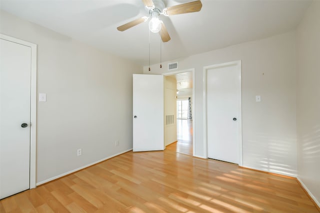 unfurnished bedroom featuring ceiling fan and light hardwood / wood-style flooring