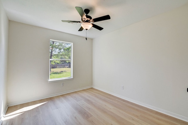 unfurnished room featuring ceiling fan and light hardwood / wood-style flooring