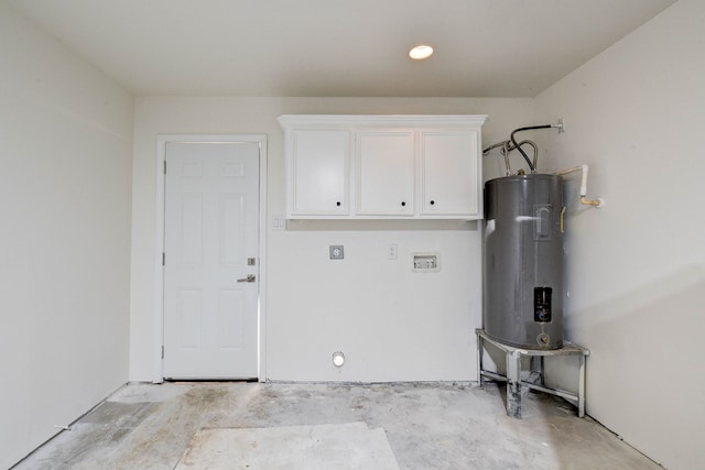 laundry area featuring hookup for an electric dryer, electric water heater, and cabinets