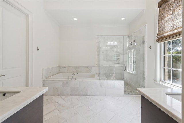 bathroom featuring vanity, crown molding, and separate shower and tub