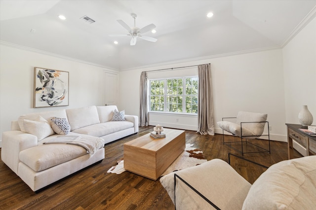 living room with lofted ceiling, dark wood-type flooring, crown molding, and ceiling fan