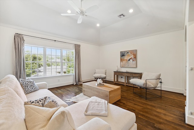 living room with dark wood-type flooring, crown molding, and ceiling fan