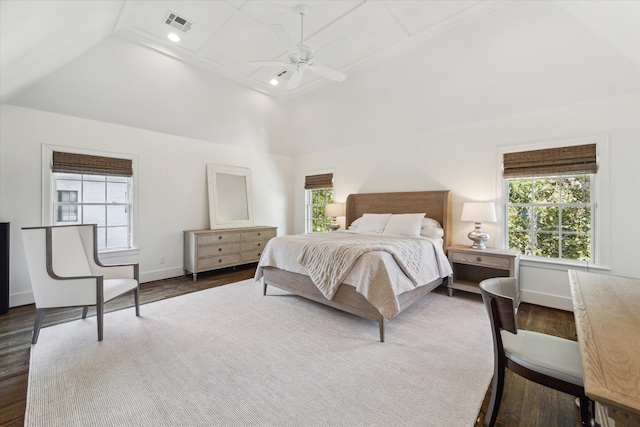 bedroom featuring ceiling fan, lofted ceiling, and dark hardwood / wood-style floors