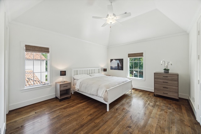 bedroom featuring crown molding, dark hardwood / wood-style floors, lofted ceiling, and ceiling fan