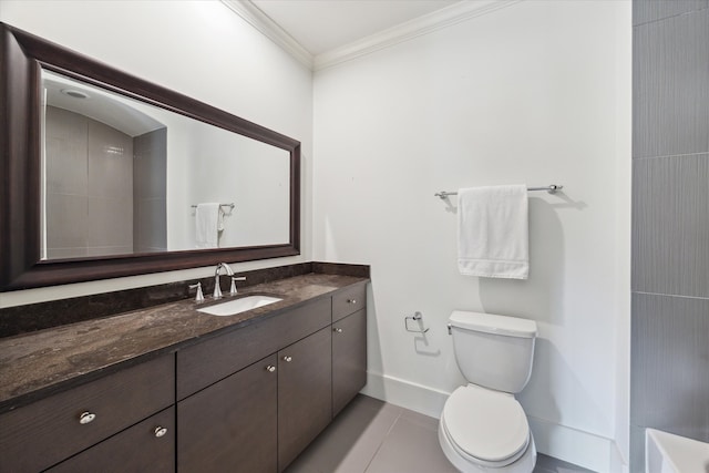 bathroom with toilet, ornamental molding, vanity, and tile patterned floors