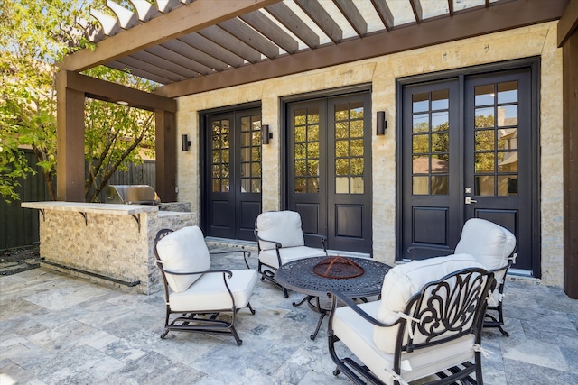 view of patio / terrace featuring french doors