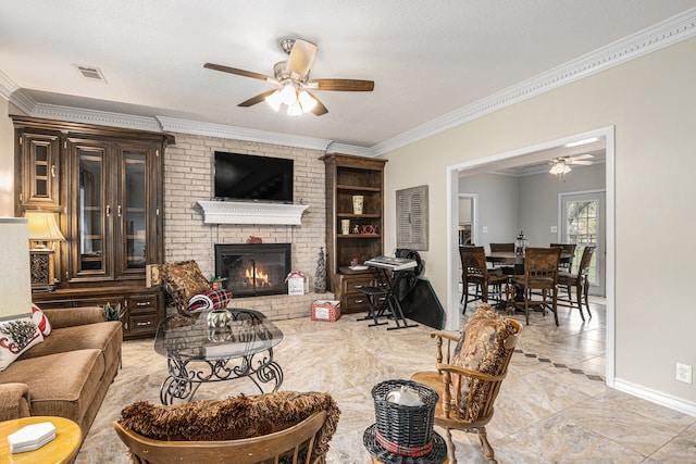 living room with a fireplace, ceiling fan, and crown molding