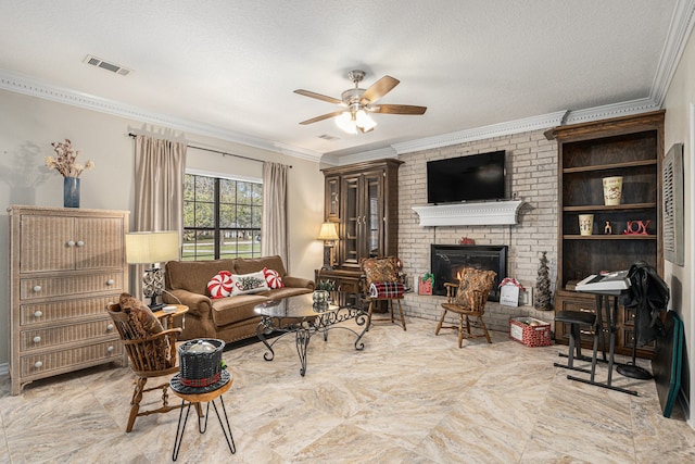 living room featuring a fireplace, a textured ceiling, ceiling fan, and ornamental molding