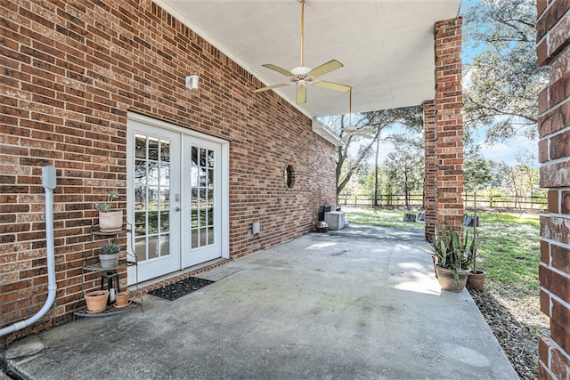 view of patio / terrace featuring french doors and ceiling fan