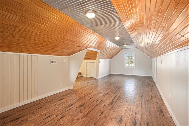 bonus room with wooden walls, hardwood / wood-style flooring, lofted ceiling, and wood ceiling