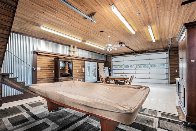 playroom featuring ceiling fan, wood walls, wood ceiling, and billiards