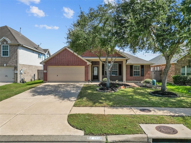 single story home featuring a front yard and a garage