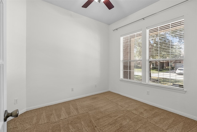 unfurnished room featuring carpet flooring and ceiling fan