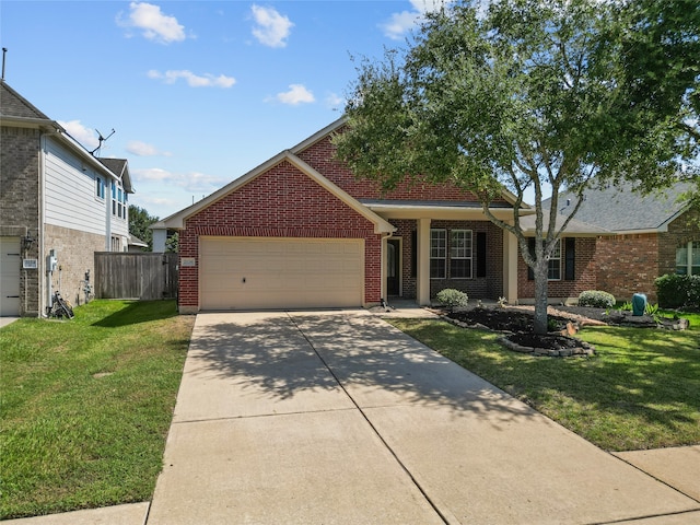 view of front of home with a garage and a front lawn