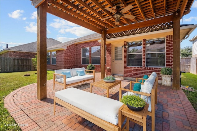 view of patio / terrace with ceiling fan and outdoor lounge area