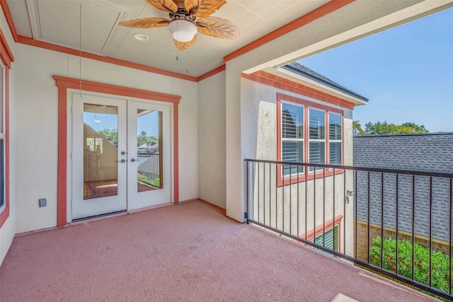 balcony with french doors and ceiling fan